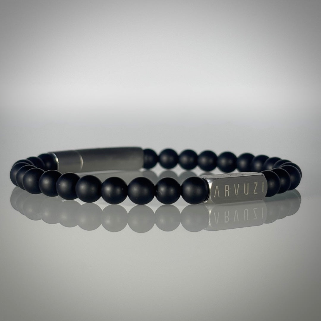 ARVUZI Onyx Noir men’s bracelet – matte black onyx beads – stainless steel clasp – angled view