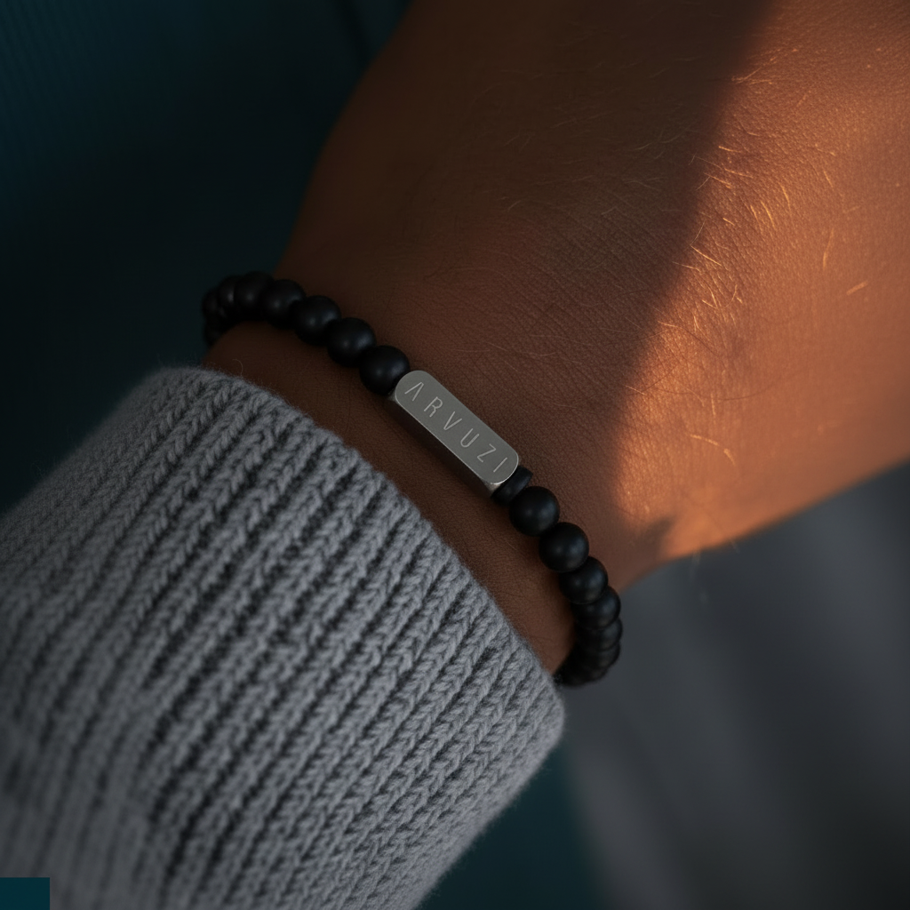 ARVUZI Onyx Noir men’s bracelet – matte black onyx beads – stainless steel clasp – on wrist 1