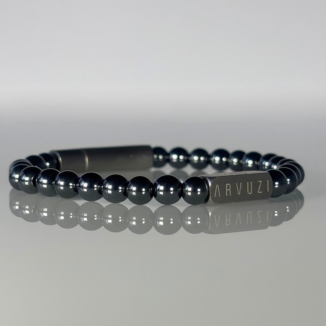 ARVUZI Hematite Core men’s bracelet – solid hematite beads – stainless steel clasp – angled view